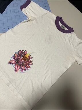 Guilty & Innocent Productions T Purple Trim & Pink Floral Graphic
youth size M